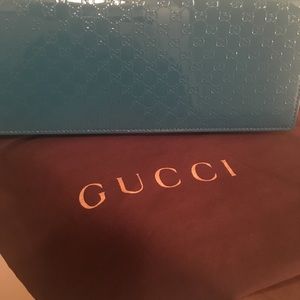 Gucci Teal color clutch